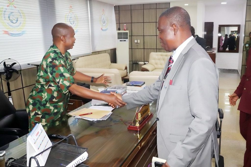 The CDSA, AVM AA Shinkafi welcoming the NARC Team Leader, Maj Gen EG Ode (rtd) to his office